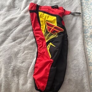 EUC Fly Racing F-16 Black, Red, and Yellow Pants Size 24